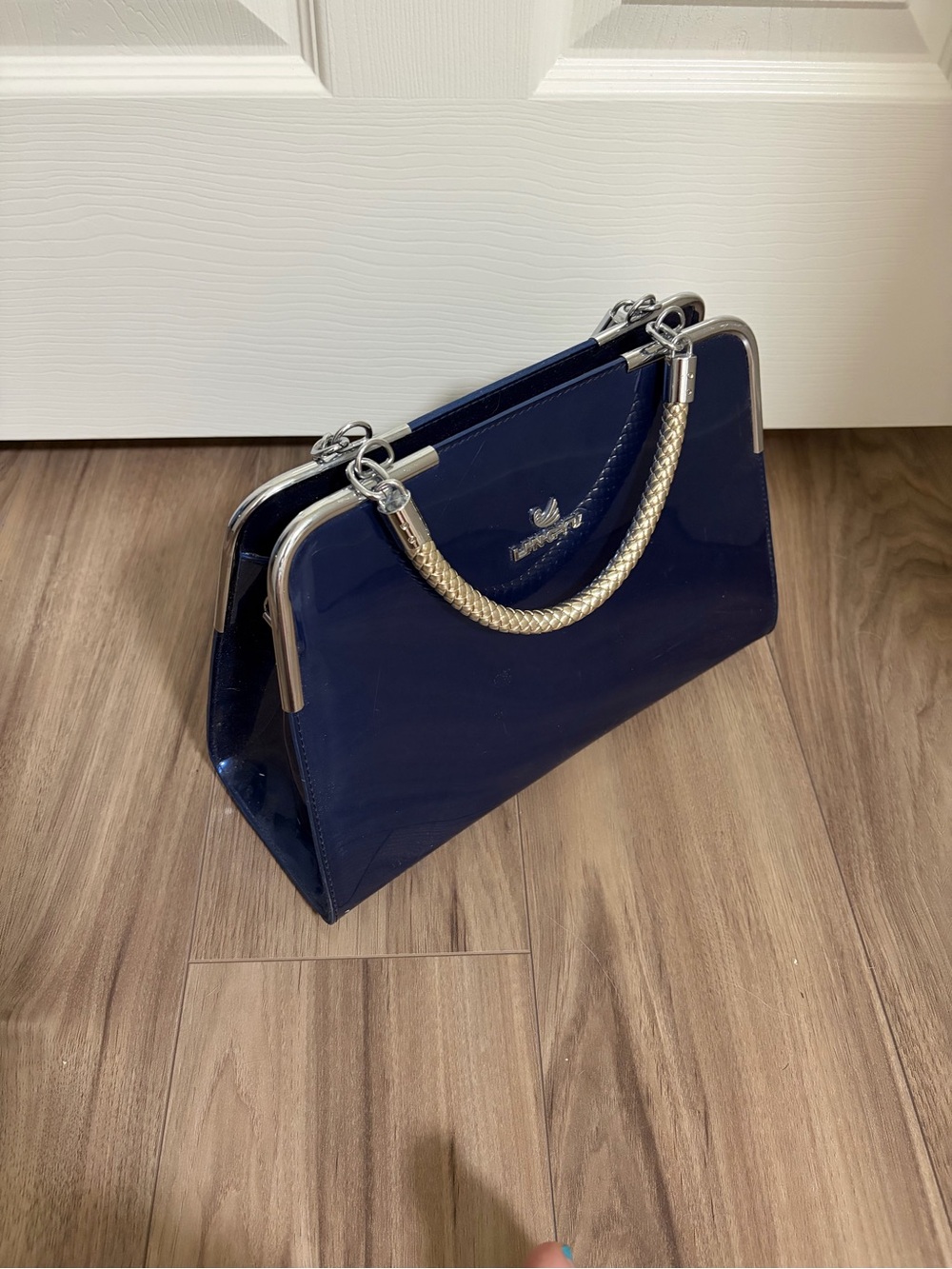 Women’s Navy Patent Handbag with silver Braided Handle